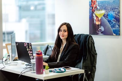 An Avispa program manager at her desk
